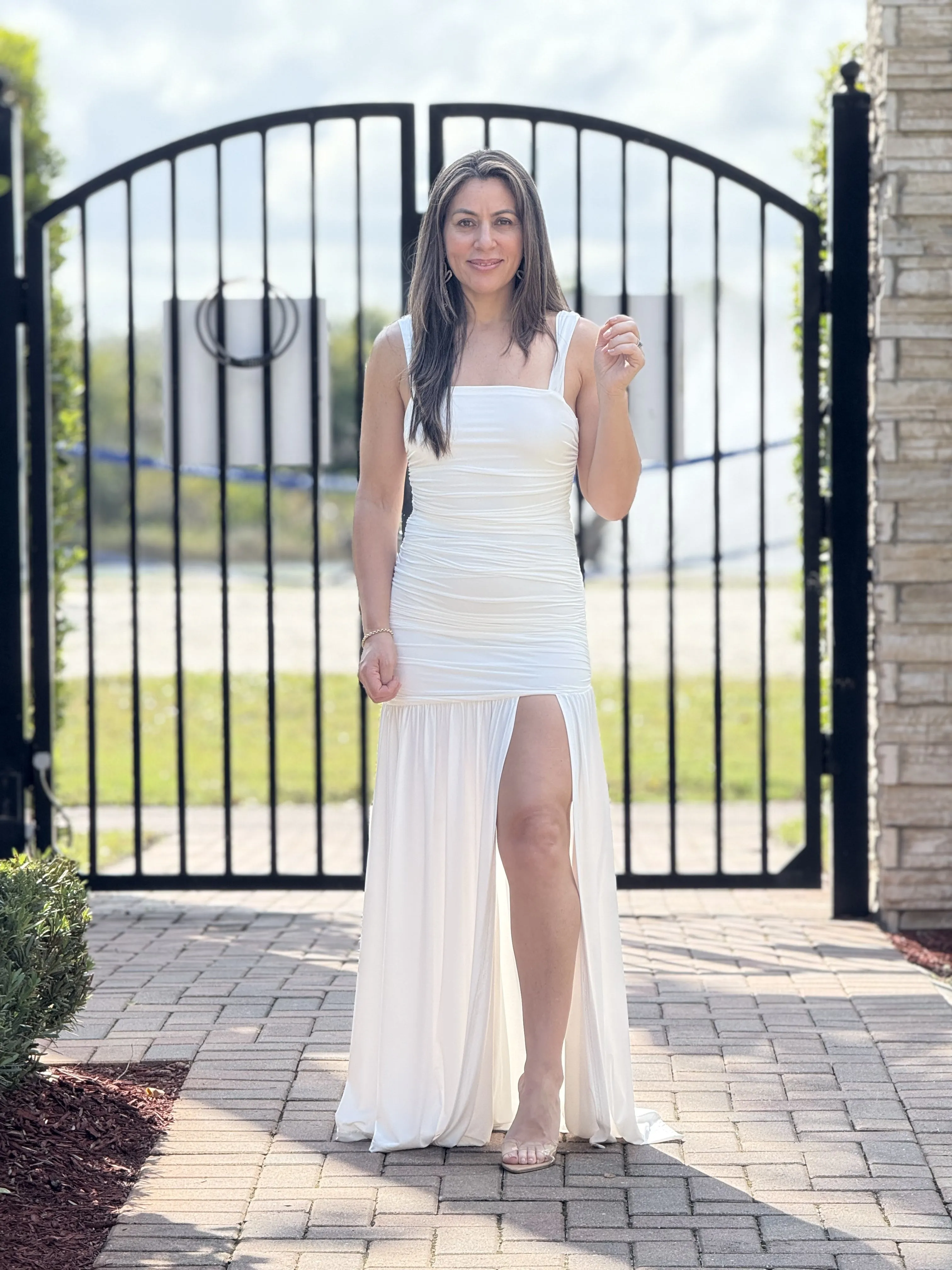 "Tessa" Solid Sleeveless Ruched Dress With A Split